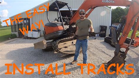 mini excavator tracks keep coming off|installing track on mini excavator.